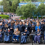 World War II vets greeted by cheers, share message for the future with Normandy Students 