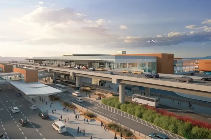 Wide shot of new SLC airport with beautiful sky in background