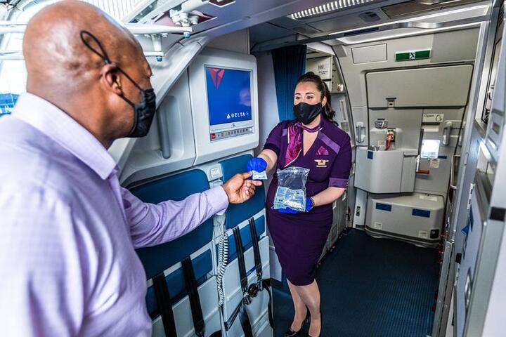 Delta hand sanitzer while boarding