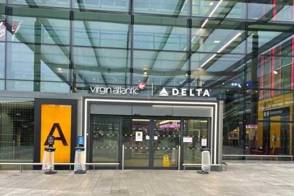 Entrance to Terminal 3 at Heathrow Airport with Virgin Atlantic and Delta logos