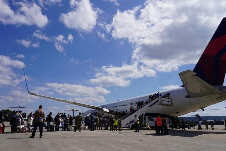 Passengers board a Delta plane at Ramstein Air Base.