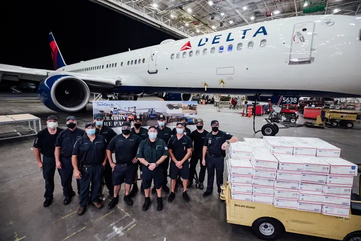 TechOps employee and veteran ships out 7,000th care package to military 