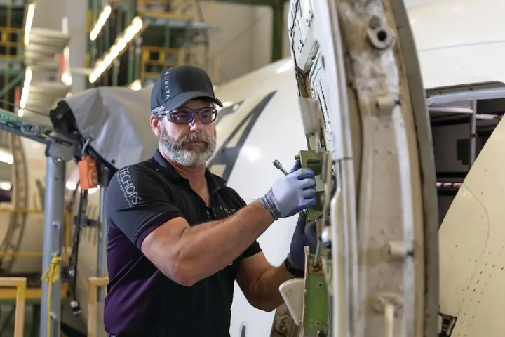 A Tech Ops employee at work.