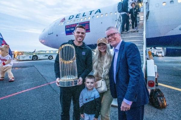 Ed poses with Freddie Freeman and his family.