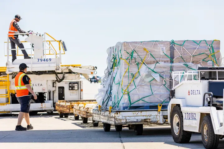 A shipment of baby formula is being received at Boston Logan Airport.