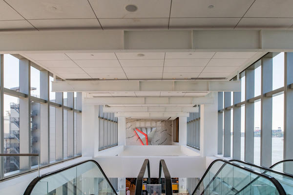 View looking down the escalator at Delta's terminal at LaGuardia Airport