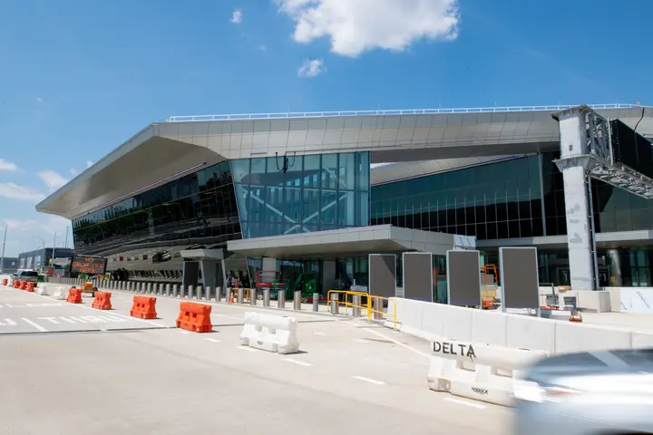 Exterior view of Delta's terminal at LaGuardia, daytime