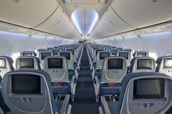 A view of the 737-900 shows the interior in the main cabin section of the aircraft.