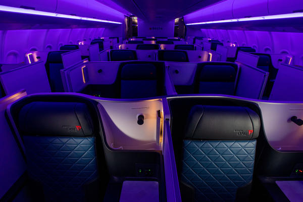 Delta One cabin aboard the A330-900neo with night time lighting