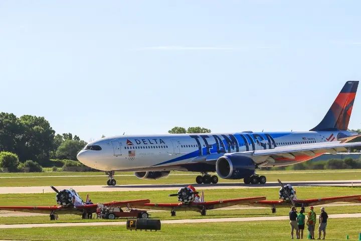 narrow horizontal photo of Team USA plane