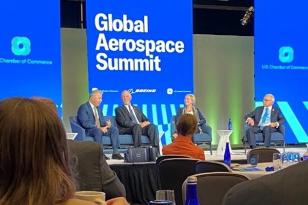 Capt. Patrick Burns speaks on a panel at the U.S. Chamber of Commerce Global Aerospace Summit in September 2022.