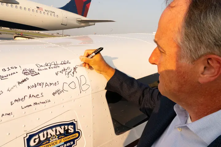 Pilots Barry Behnfeldt and Aaron Wilson, along with maintenance technician Thomas Twiddy make a stop at Hartsfield-Jackson Atlanta International Airport (ATL) during their 48N48 mission -- an attempt to land in all 48 of the contiguous states within 48 hours. They were greeted by Delta Chief of Operations John Laughter.