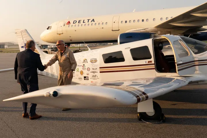 Pilots Barry Behnfeldt and Aaron Wilson, along with maintenance technician Thomas Twiddy make a stop at Hartsfield-Jackson Atlanta International Airport (ATL) during their 48N48 mission -- an attempt to land in all 48 of the contiguous states within 48 hours. They were greeted by Delta Chief of Operations John Laughter.