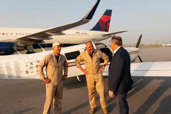 Pilots Barry Behnfeldt and Aaron Wilson, along with maintenance technician Thomas Twiddy make a stop at Hartsfield-Jackson Atlanta International Airport (ATL) during their 48N48 mission -- an attempt to land in all 48 of the contiguous states within 48 hours. They were greeted by Delta Chief of Operations John Laughter.