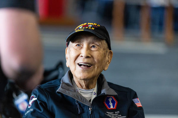 WWII veteran Jimmy Doi arrives at Hartsfield-Jackson Atlanta International Airport to board a flight to Normandy, France, for the 79th annual commemoration of the 1944 D-Day invasion.  