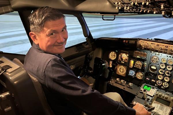 After a few fun trips in the Boeing 737-200 flight simulator, Todd O., Delta's most frequent flyer, prefers to fly in Delta One than a pilot seat. 