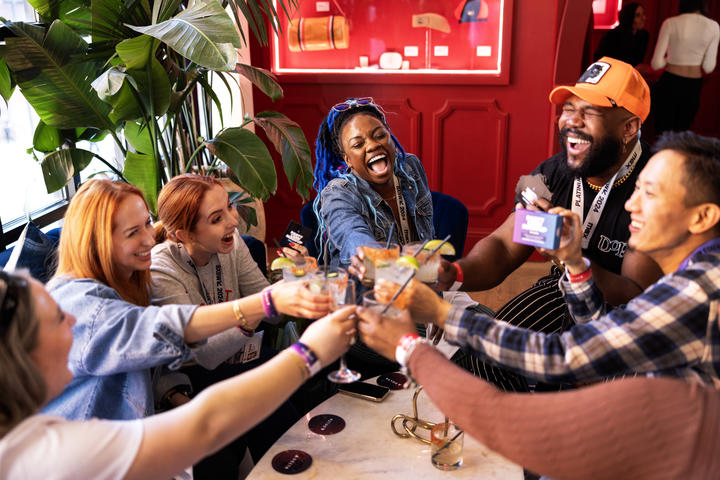 SkyMiles members have a moment of relaxation and celebration in the Delta Lounge during the SXSW 2024 festivities.