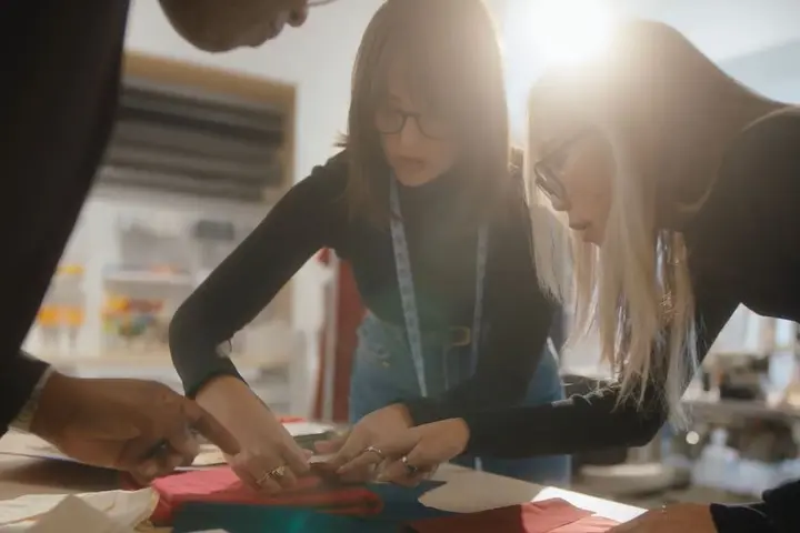 Designers at GPS Apparel by Gap Inc. work on Delta's new uniform protype collection.