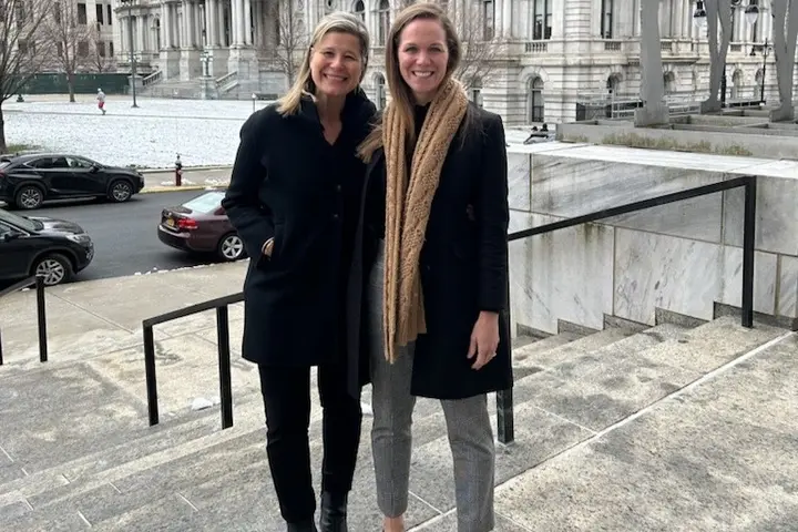 Delta Chief Sustainability Officer Amelia DeLuca (right) with Patricia Ornst, Managing Director - Government Affairs, outside the New York Capitol in Albany.