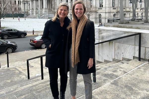 Delta Chief Sustainability Officer Amelia DeLuca (right) with Patricia Ornst, Managing Director - Government Affairs, outside the New York Capitol in Albany.