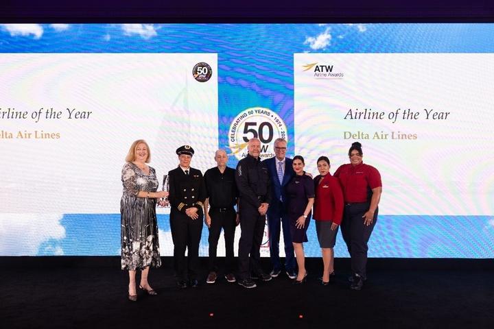 Delta CEO Ed Bastian was joined onstage by six uniformed employees to accept the ATW Airline of the Year Award and Hall of Fame Honor in Dubai on Friday, May 31.