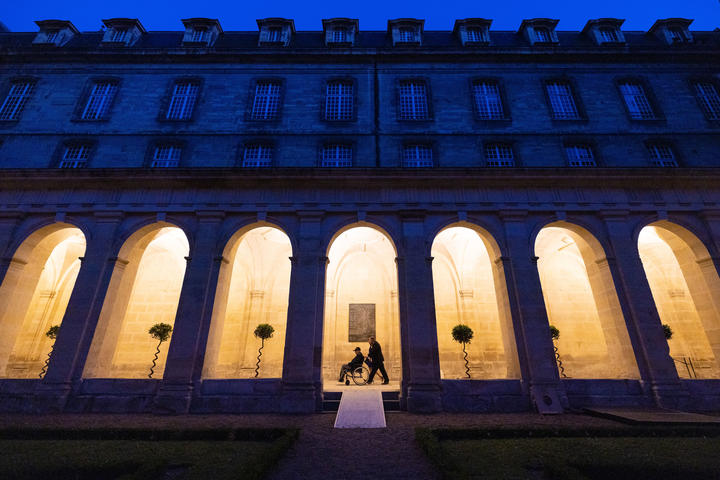 At Abbaye aux Hommes, a former Benedictine monastery in Caen founded in 1063 by William the Conqueror, veterans celebrated the near completion of the program with a farewell dinner hosted by Mayor Joël Bruneau.