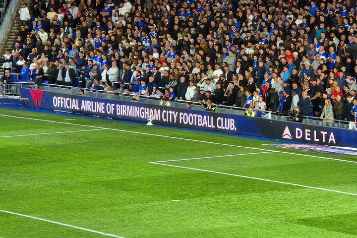 Delta branding can be seen on the sidelines during a Birmingham City Football Club game.