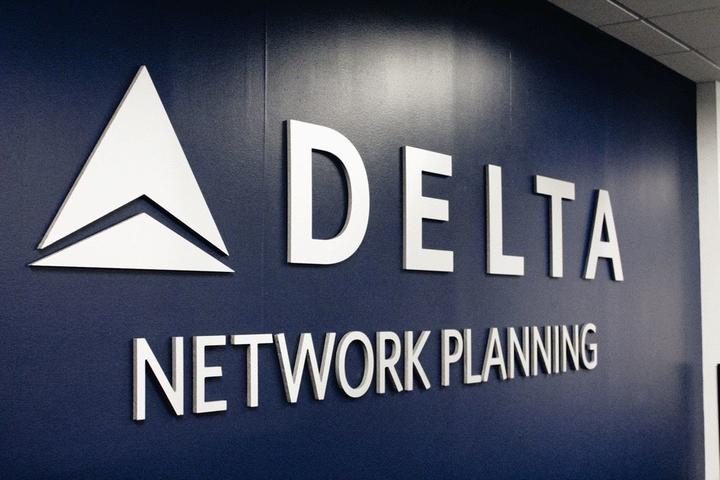 The sign outside the office of Delta's Network Planning team