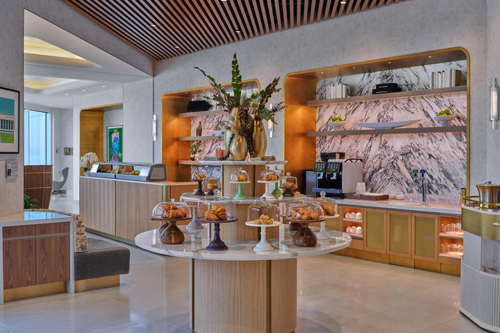 A central multi-tiered table at the Delta One Lounge at LAX will house desserts and savory bites.