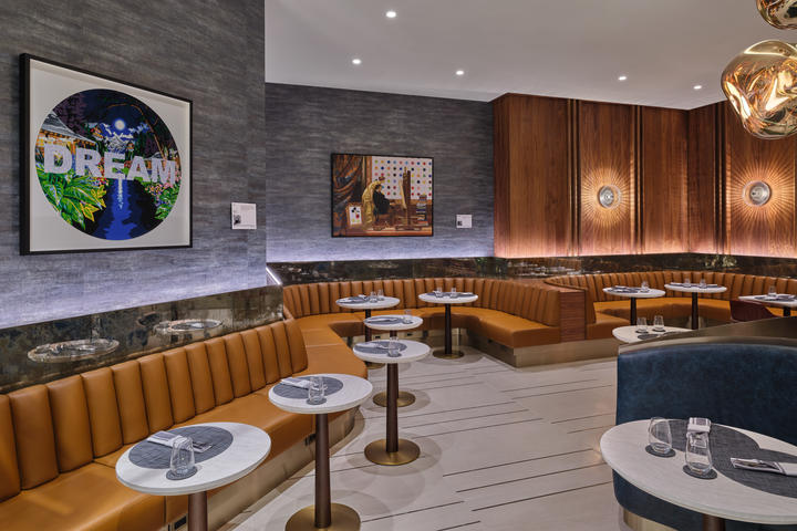 A shot of some seats in the dining room area of the LAX Delta One Lounge