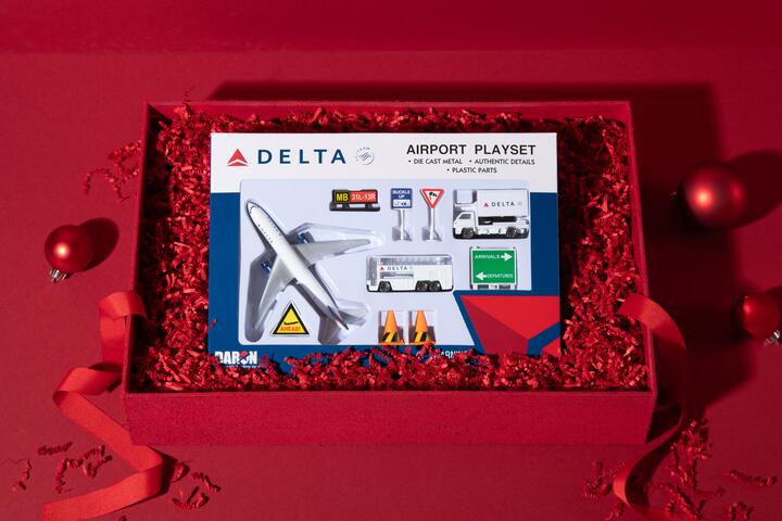 This 10-piece Delta airport playset is the perfect gift for the little aviation enthusiast in your life. Set includes an authentically detailed plane and a variety of vehicles and signs.  