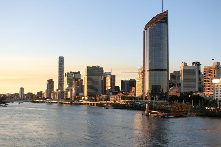 Aerial photo of skyscrapers overlooking a body of water in Brisbane, Australia