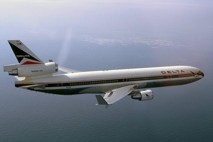 MD11 flying above water