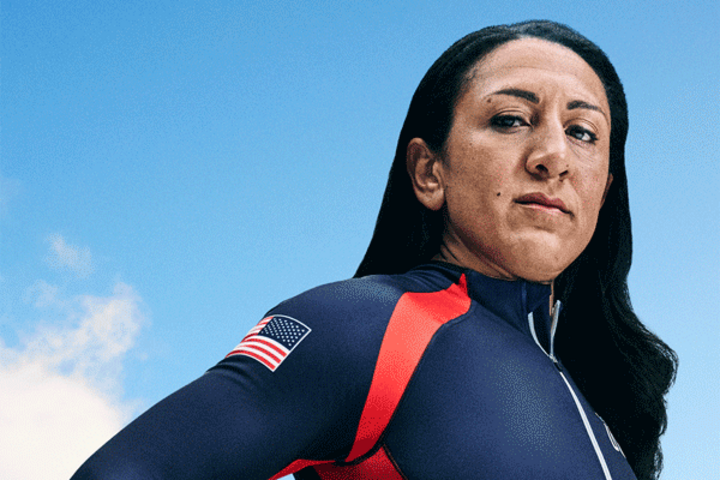 Elana Meyers Taylor posing with bobsled helmet