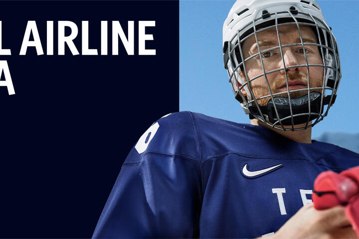 Promotional graphic with text reading ‘The Official Airline of Team USA’ and ‘Declan Farmer – Sled Hockey,’ along with Delta, Olympic and Paralympic logos. On the right, athlete wears blue hockey uniform holding red gloves with snowy mountains in background