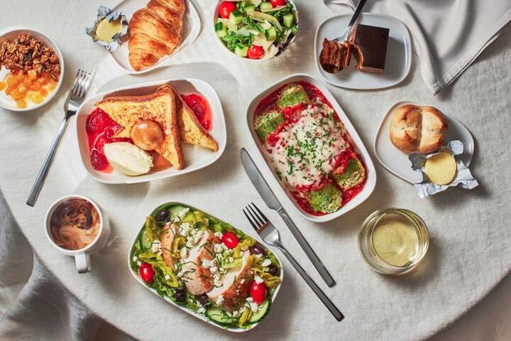 A spread of food featured on Delta flights for Delta One and Premium Select customers