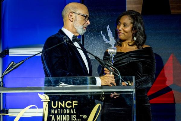 Cherie Wilson, V.P. of Government Affairs at Delta accepted the UNCF Keeper of the Flame award from Milton Jones, Chairman of UNCF, and Dr. Michael Lomax, UNCF’s President and CEO.