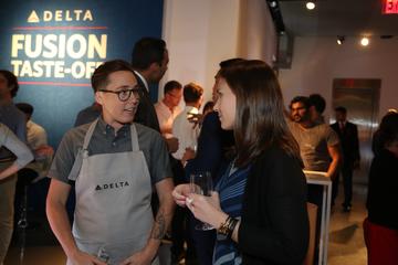 Chef and SkyMiles member talking at Fusion Taste-Off
