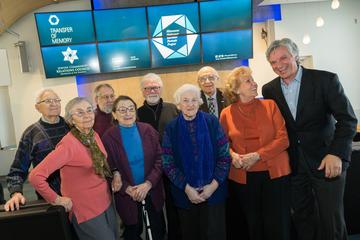 Holocaust survivors at Delta opening reception for Transfer of Memory exhibit in MSP
