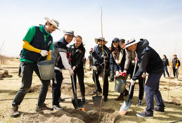 Delta and Korean Air employees plant a tree