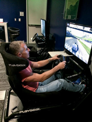 Customer tests out Porsche simulator
