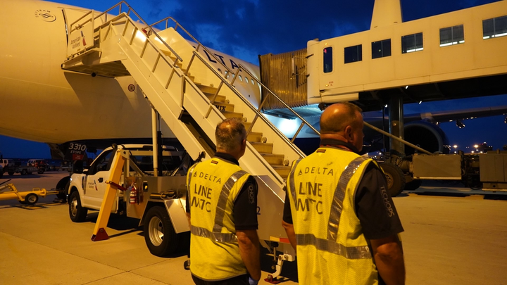 Delta employees prepare to help evacuees from Afghanistan at Dulles International Airport.