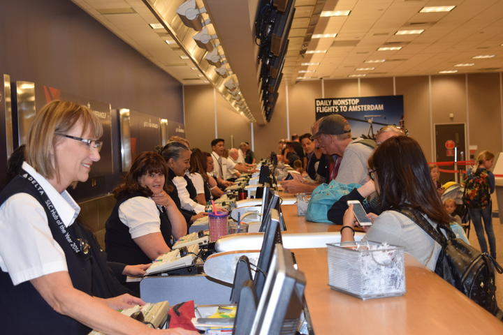 Employees helping customers in Salt Lake City after outage