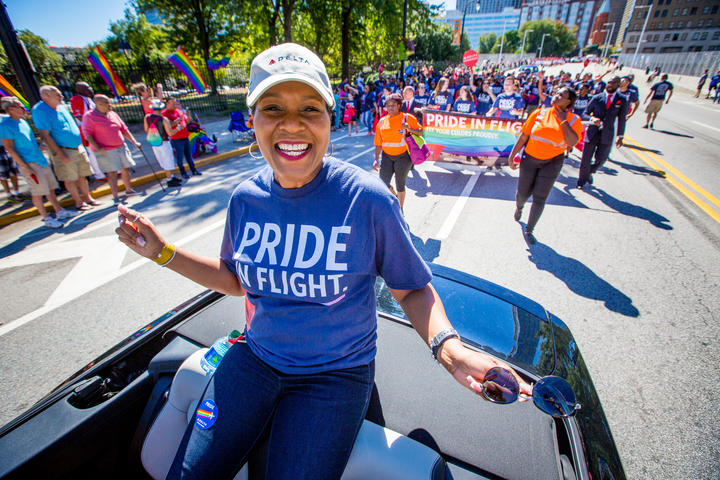 Employees march in Pride