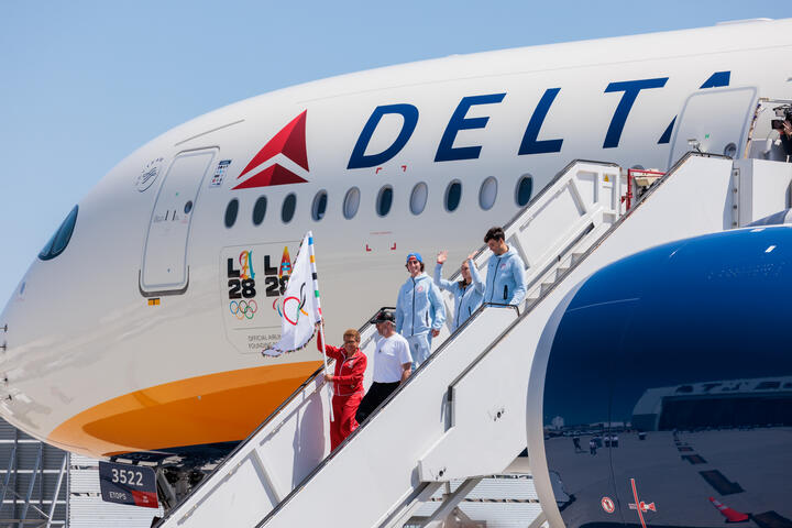 As the Official Airline of Team USA and an inaugural Founding Partner of the LA28 Olympic and Paralympic Games, Delta is honored to be part of the flag’s transfer from one iconic city to the next, bringing a delegation from Team USA, LA28, and notable dignitaries on board as well.