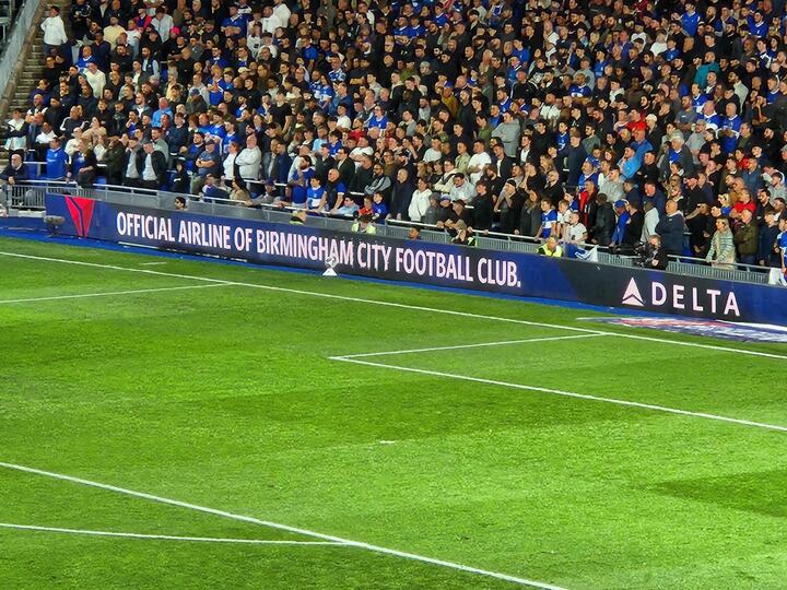 Delta branding can be seen on the sidelines during a Birmingham City Football Club game.