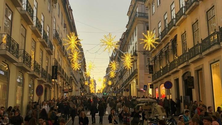 A lit up street in Lisbon, Portugal