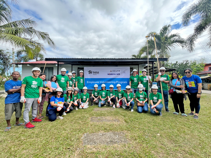 Group of Delta employees gathered at Habitat for Humanity project