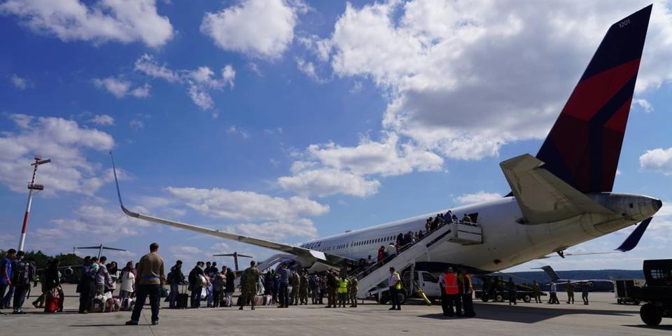 Passengers board a Delta plane at Ramstein Air Base.