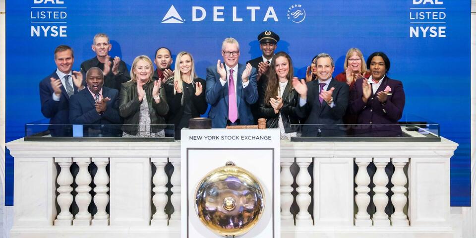 Ed Bastian is joined by Delta employees at the NYSE.